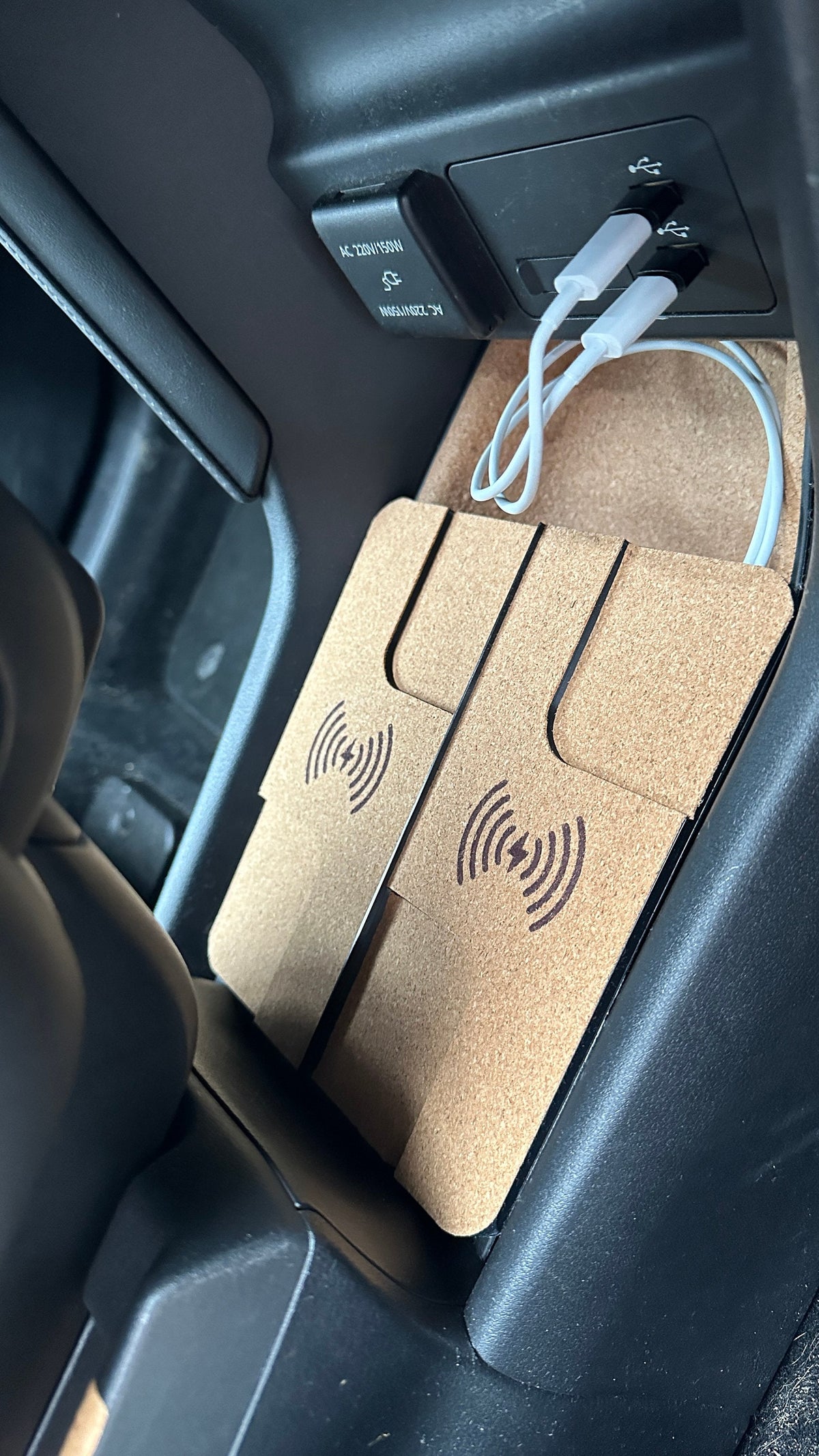 Top view of the dual wireless charger fitted in the Mazda MX-30 console