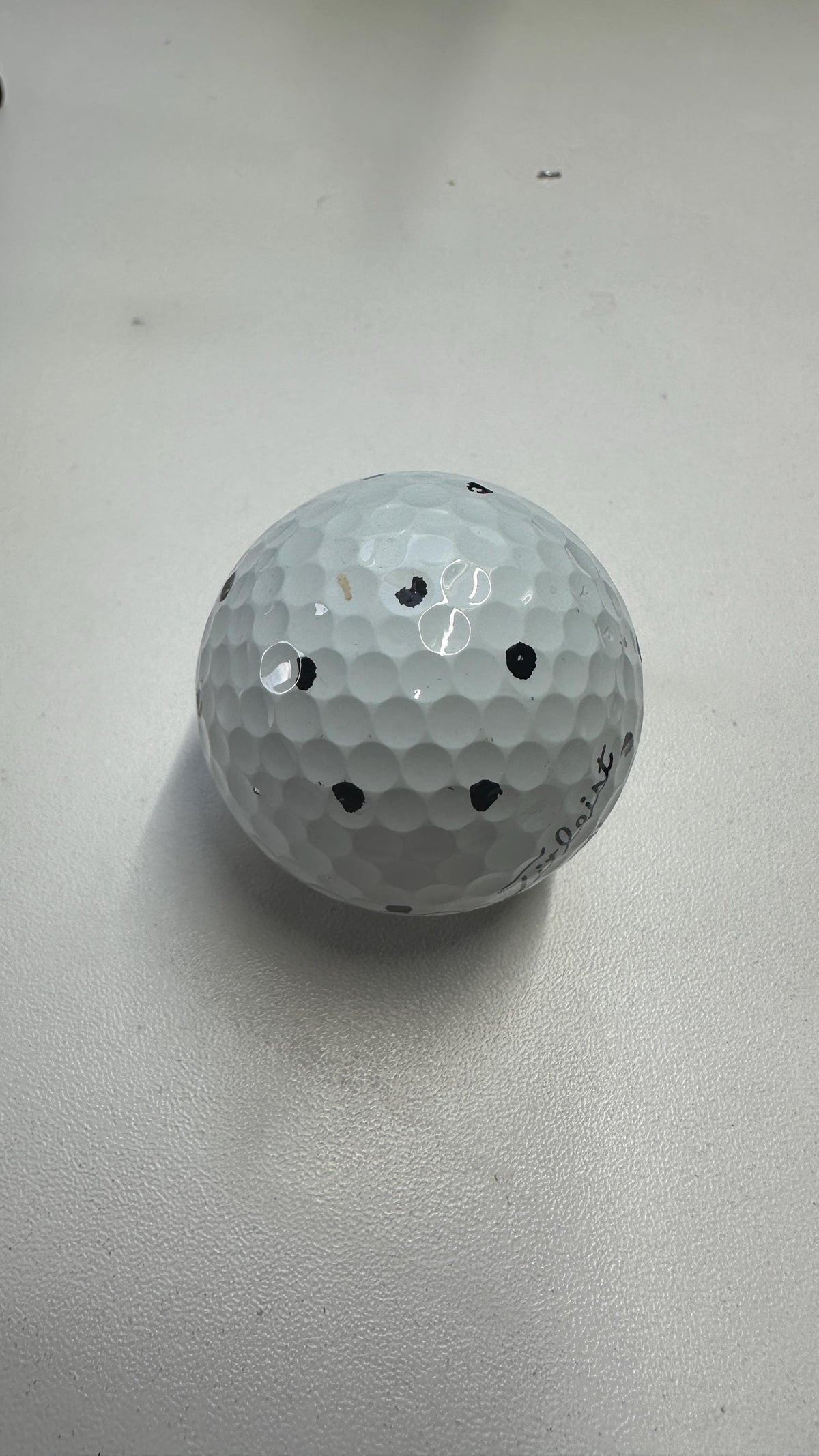 Golf ball with dot markings made using the printed marker