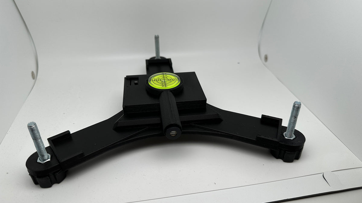 Rapsodo MLM2PRO leveling stand with yellow bubble level and three adjustable feet