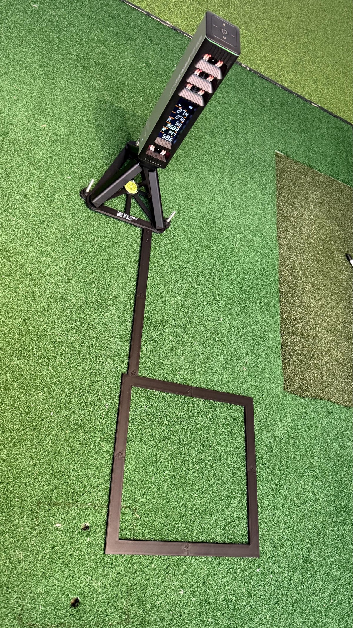 Example of the printed Omni base and hitting zone frame assembled with a launch monitor. Launch monitor, original tripod and hardware are not included in the digital download.